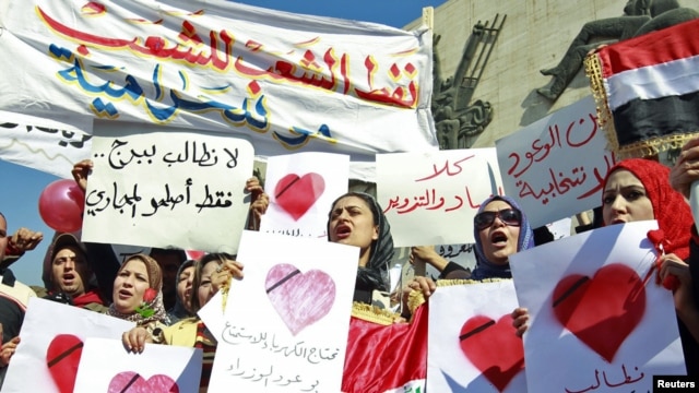 Iraqi women demonstrate against the lack of basic services in central Baghdad on February 14.