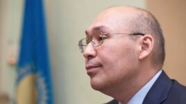 Кайрат Келимбетов в бытность председателем Национального банка Казахстана. Алматы, 11 февраля 2014 года.