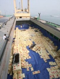 Rice being loaded on October 10 onto a South Korean ship to be delivered to North Korea (epa)