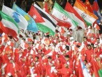 Athletes carrying their national flags at the Asian Games in the Qatari capital on December 1 (Fars)