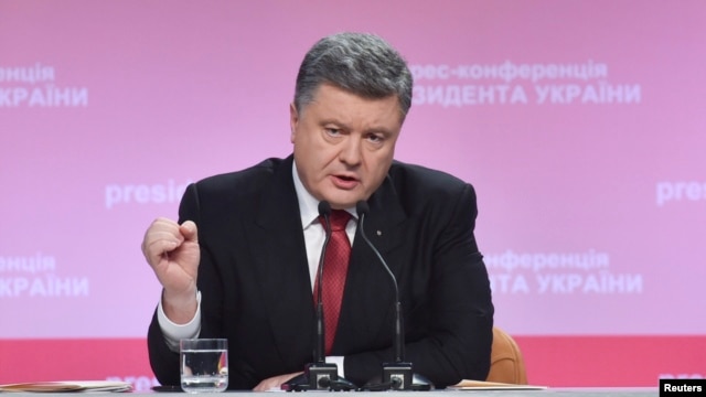 Ukrainian President Petro Poroshenko speaks during a news conference in Kyiv on December 29.