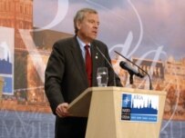 NATO Secretary-General Jaap de Hoop Scheffer addressing a NATO meeting in Riga on November 27 (NATO)