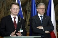 Jailed Belarusian opposition leader Vintsuk Vyachorka (left) and the Council of Europe's Rene van der Linden at the conference, \