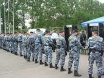 Police depoloyed to contain anti-G8 demonstrators at St. Petersburg's Kirov Stadium on July 15 (RFE/RL)
