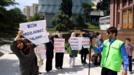 Relatives of arrested Islamic Party activists protested in front of the president's offices in Baku in June. The crackdown on the party has since intensified.
