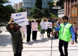 Relatives of arrested Islamic Party activists protested in front of the president's offices in Baku in June. The crackdown on the party has since intensified.