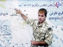 One of the British marines pointing to where he was captured on Iran's Al-Alam TV on April 1 (epa)