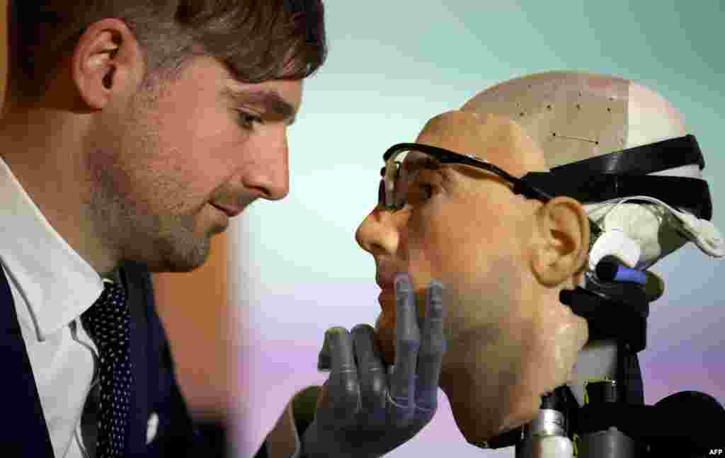 Researcher Bertolt Meyer, a lifelong user of prosthetic technology and the model for the robot "Rex" at the Science Museum in London. The $1 million so-called "bionic man" has a distinctly human shape and boasts prosthetic limbs, a functional circulatory system complete with artificial blood, as well as an artificial pancreas, kidney, spleen, and trachea. (AFP/Andrew Cowie)