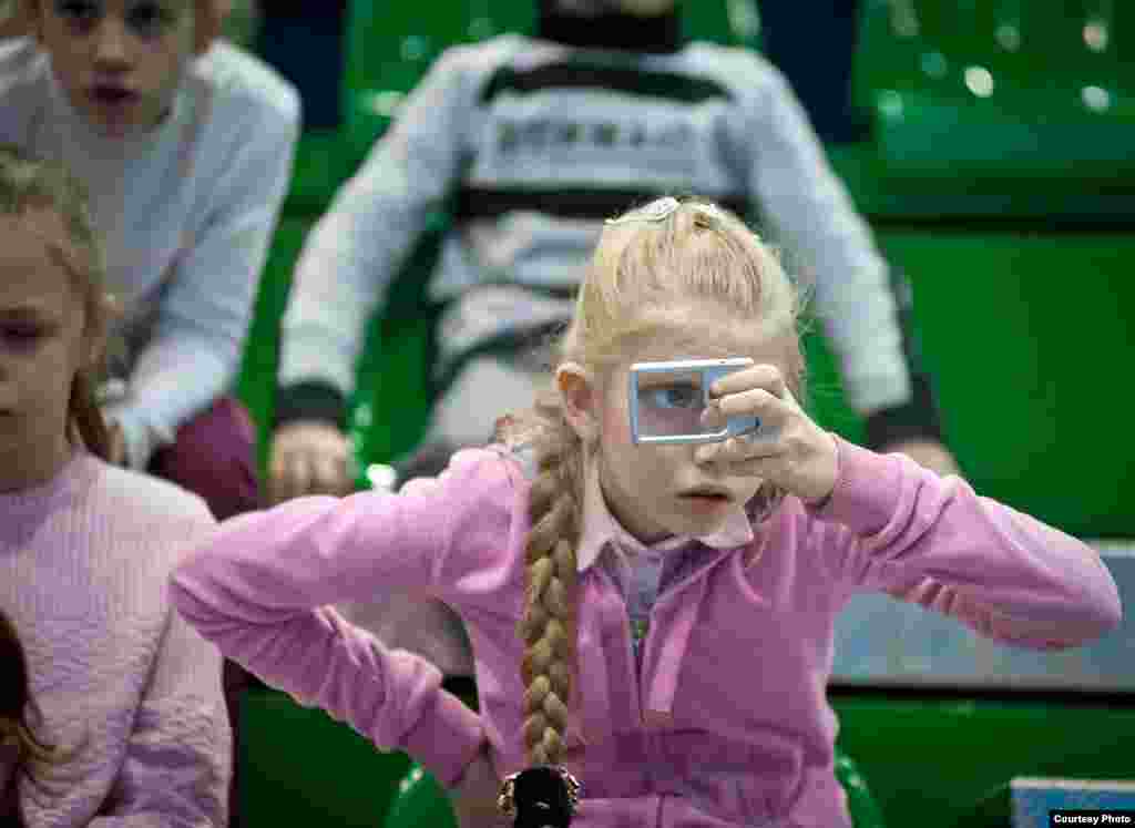 A girl suffering from partial blindness participates in a special sporting event for disabled and orphaned children in St. Petersburg in March 2012.