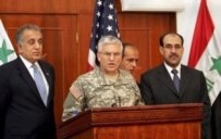 General Casey (center) at a press conference in June, flanked by Iraqi Prime Minister Nuri al-Maliki (right) and Ambassador Khalilzad (epa)