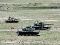 Turkish troops have been massing near the Iraqi border (AFP)