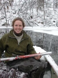 Katey Walker taking measurements in Siberia (photo by Dmitri Draluk)