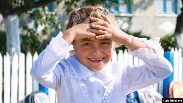 Moldova - Bursuc school, girl in the first form, 18Sep2009