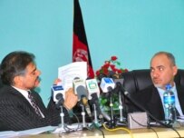 Minister Mohammad Amin Fatemi (left) with the World Health Organization's Riyad Musa on August 15 (Pajhwak Afghan News)