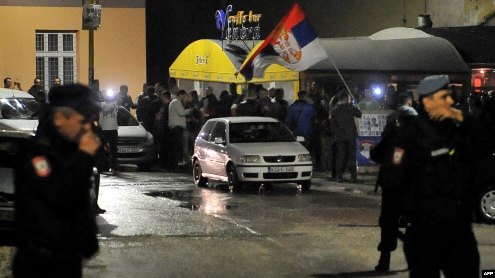 Election night in Srebrenica was tense. The two sides gathered on opposite sides of the street as one celebrated -- with a police cordon in between.