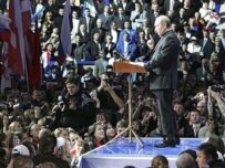 Vladimir Putin addressing today's rally (AFP)