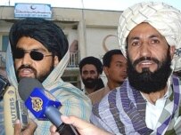 Taliban spokesmen speaking to the media (AFP)