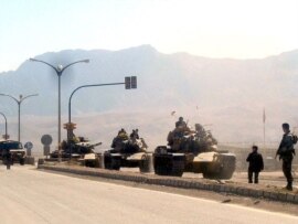 Reports say Turkish tanks are headed toward a Kurdish militant camp inside Iraq. 