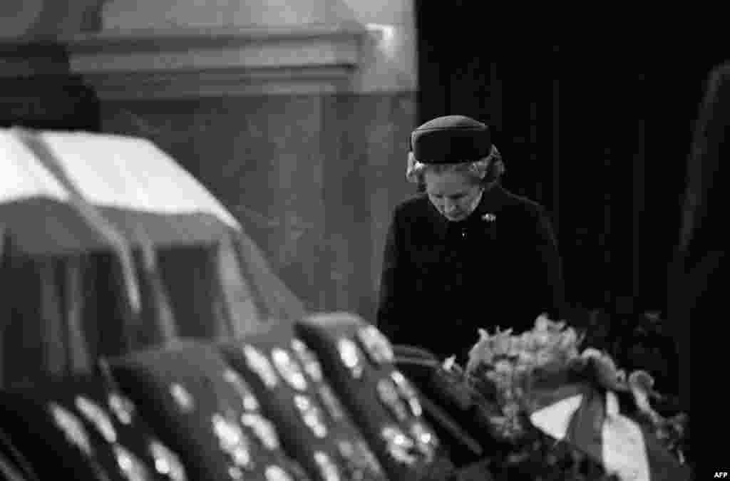 Margaret Thatcher pays her last respects to Yugoslavia's Marshal Tito during his funeral at the parliament in Belgrade in May 1980.