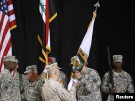 تسليم الراية للقوات الأميركية الباقية في العراق