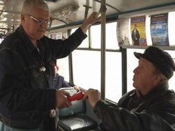 Russia -  Aleksandr Zverkov, the former Rybinsk news reader, now working on a trolleybus, Oct2011