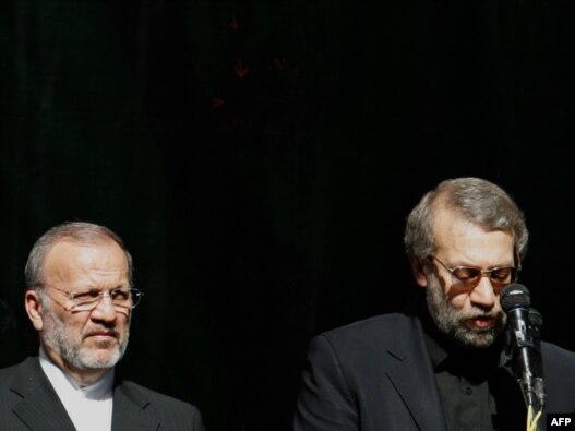 علی 
لاریجانی (راست) و منوچهر متکی