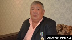 «Құқық тәртібін қамтамасыз етуге қосқан үлесі үшін» медалімен марапатталған Ақтөбе тұрғыны Қуаныш Қарасартов. Ақтөбе, 30 тамыз 2016 жыл.