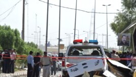 عناصر أمنية في كربلاء بعد حادث تفجير 