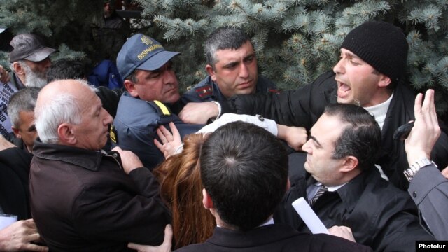 Armenia - Riot police and opposition activists scuffle in Yerevan's Liberty Square, 14Mar2013.