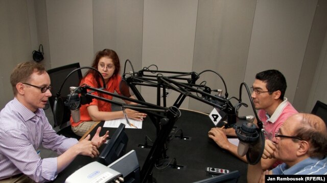 Host Pavel Butorin (left) discusses the 1991 Soviet putsch with Natalia Churikova of our Ukrainian Service (second from left), Alisher Sidikov from the Uzbek Service, and Harry Tamrazian of our Armenian Service.