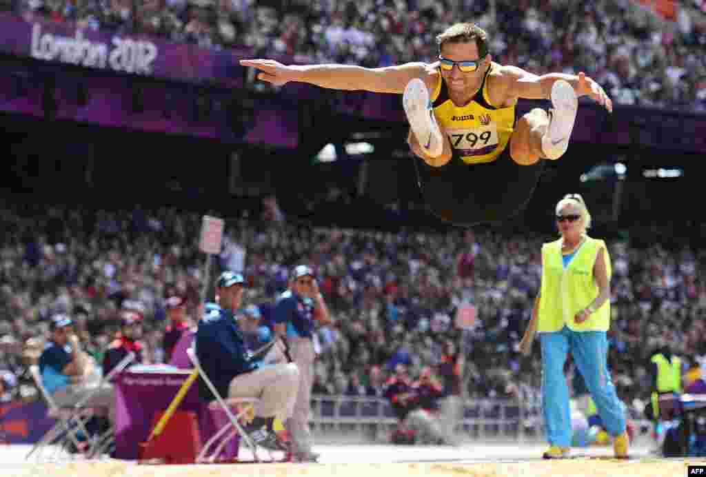 Ukraine's Ruslan Katyshev competes in the men's triple-jump final.