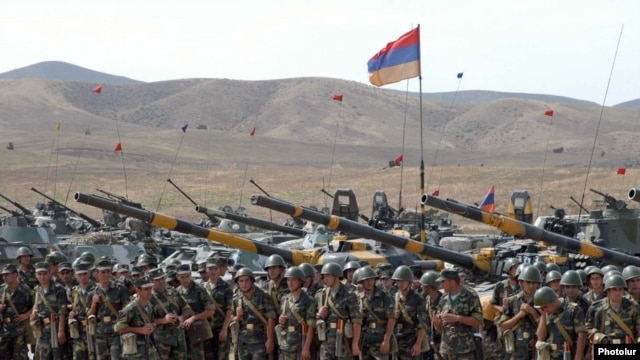 Armenia - Soldiers and tanks lined up for a military exercise, undated.