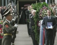 The burial of Andrei Kozlov, deputy head of the central bank, murdered in September (ITAR-TASS)