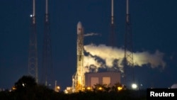 An unmanned Space Exploration Technologies' Falcon 9 rocket is seen on the launching pad at Cape Canaveral, Florida, a week ahead of the successful December 3 mission.