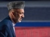 Despite Failings, Karzai Hangs On To Front-Runner Status 