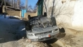 An overturned car from the Sokh violence