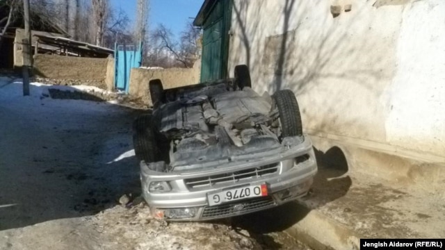 An overturned car from the Sokh violence