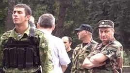 South Ossetian leader Eduard Kokoity (right) outside Tskhinvali on August 7