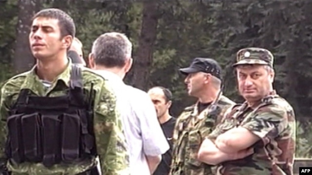 South Ossetian leader Eduard Kokoity (right) outside Tskhinvali on August 7