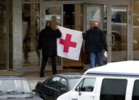 Red Cross workers enter the building during the October 2002 Moscow theater hostage taking (TASS)
