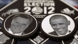 Chocolates with the faces of US President Barack Obama (R) and US Republican presidential candidate Mitt Romney are displayed in a chocolate box in Paris, 12Oct2012