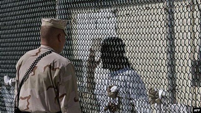 How can the inmates at Guantanamo be tried, and where can they be released?