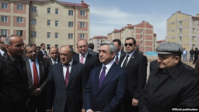 Armenia - President Serzh Sarkisian inspects new apartment blocks constructed in Gyumri, 7Apr2012. 