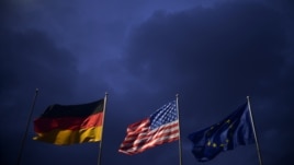 Steagurile german, american şi al UE în deschiderea conferinţei de la München