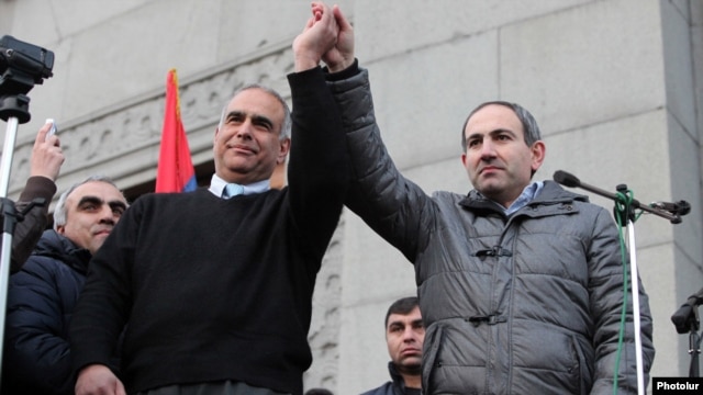 Armenia - Opposition leaders Raffi Hovannisian (L) and Nikol Pashinian greet protesters in Yerevan's Liberty Square, 20Feb2013.