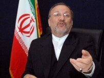 Iran Foreign Minister Mottaki speaking in Sharm el-Sheikh today (AFP)