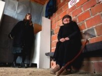 An ethnic Serb leaves a polling station in the mountain village of Slivovo, in Kosovo