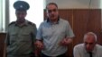Azerbaijani journalist Eynulla Fatullayev stands trial for possession of drugs in 2010. He was found guilty of the charges, which Amnesty International described as "fabricated," and sentenced to 2 1/2 years imprisonment.