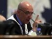 Judge Ra\'uf Rashid Abd al-Rahman reading the verdicts against Saddam Hussein and the other defendants in Baghdad on November 5 (epa)