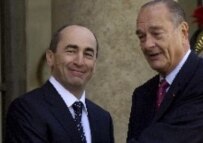 French President Jacques Chirac (right) greets Armenian President Robert Kocharian at the Elysee Palace in Paris, January 2006 (epa)